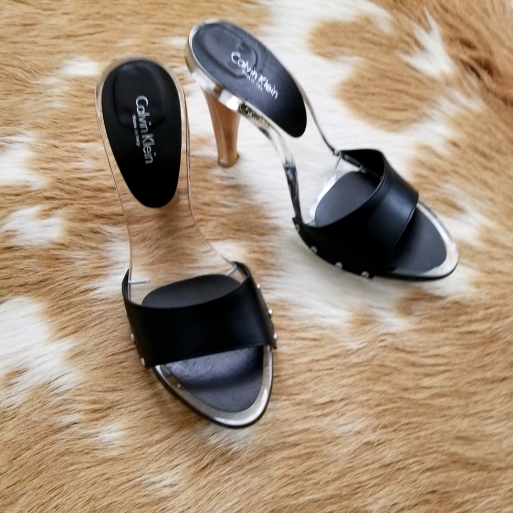Leather, wood and lucite mules by Calvin Klein